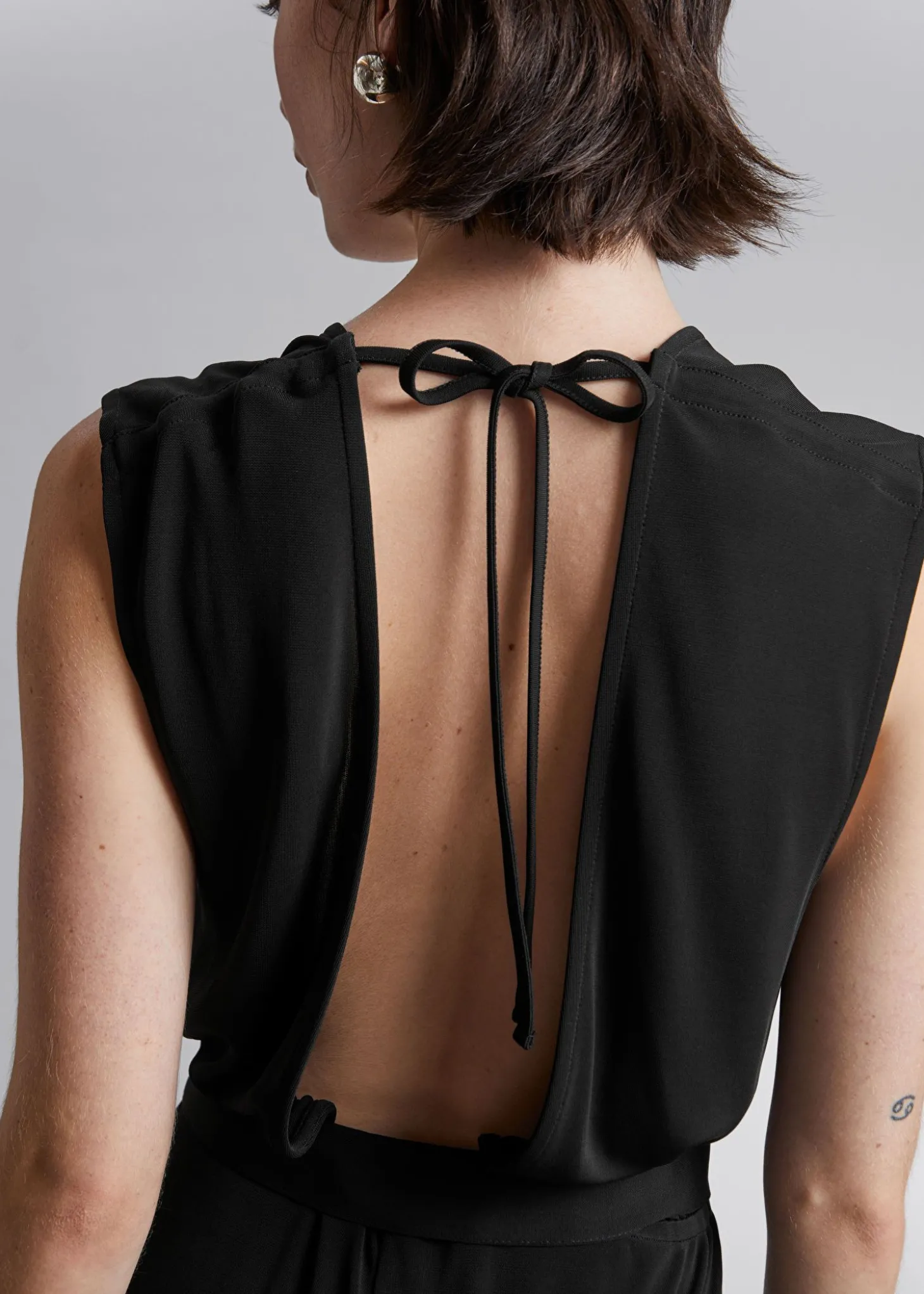 Ermelos Jumpsuit Med Apen Rygg