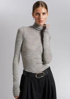 Langermet Topp Med Turtleneck I Ull