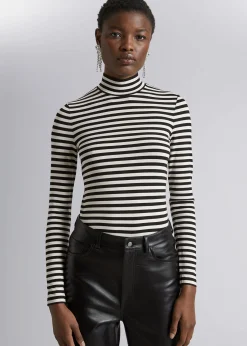 Topp Med Turtleneck