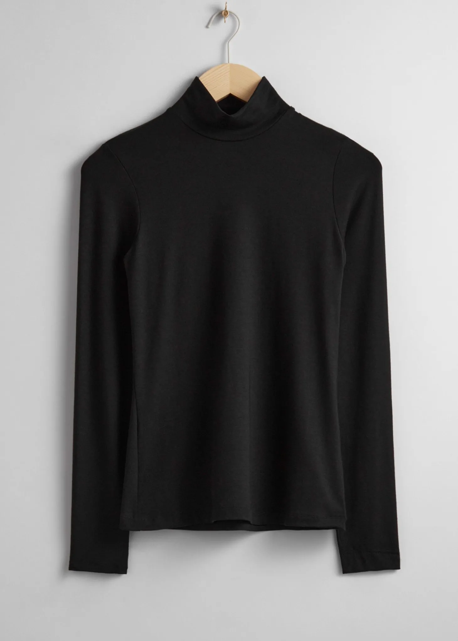 Topp Med Turtleneck