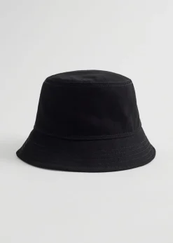 Toppsydd Denim Bottehatt