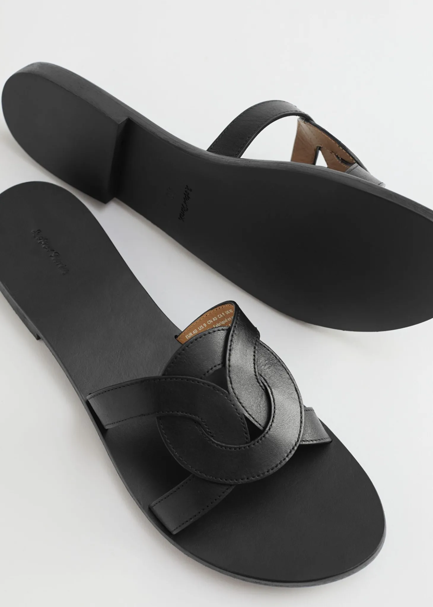 Vevde Skinnsandaler